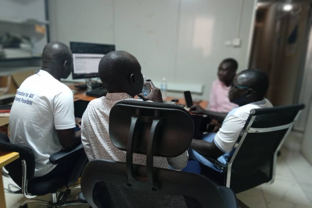 Participants reviewing community health data, South Sudan, 2025 – ICHESS Participants reviewing community health data, South Sudan, 2025 – ICHESS